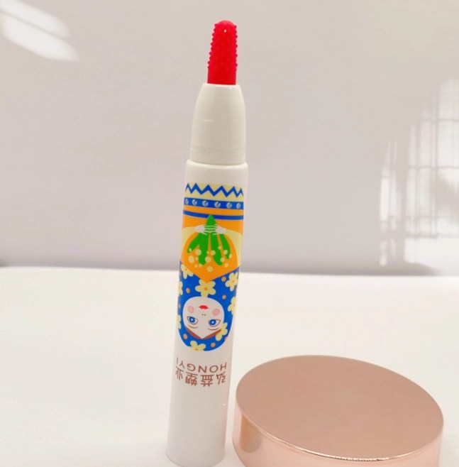 19 Silicone head design plastic tube bottle PE packaging bottle